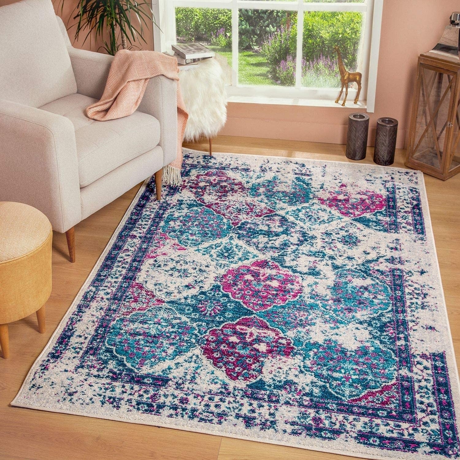 the vintage-style rug on the floor of a living room