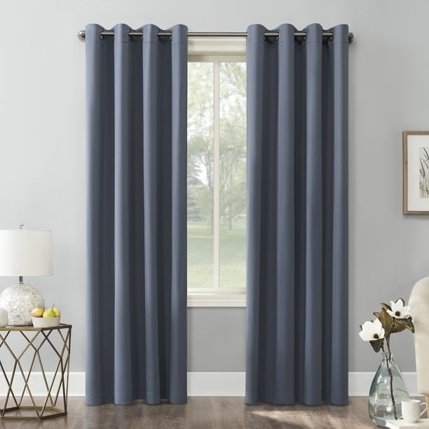 The curtain panels in the color Denim Blue
