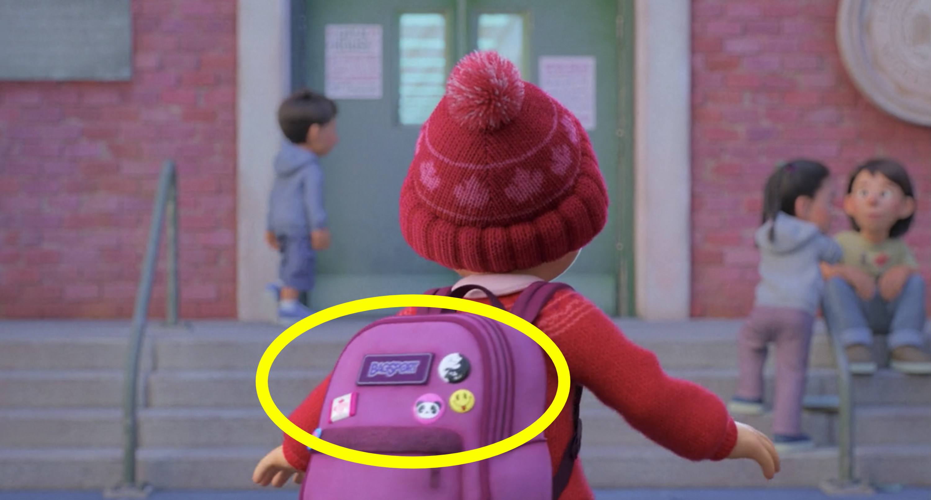 Mei walking into school with the logo &quot;BagSport&quot; circled on her bookbag