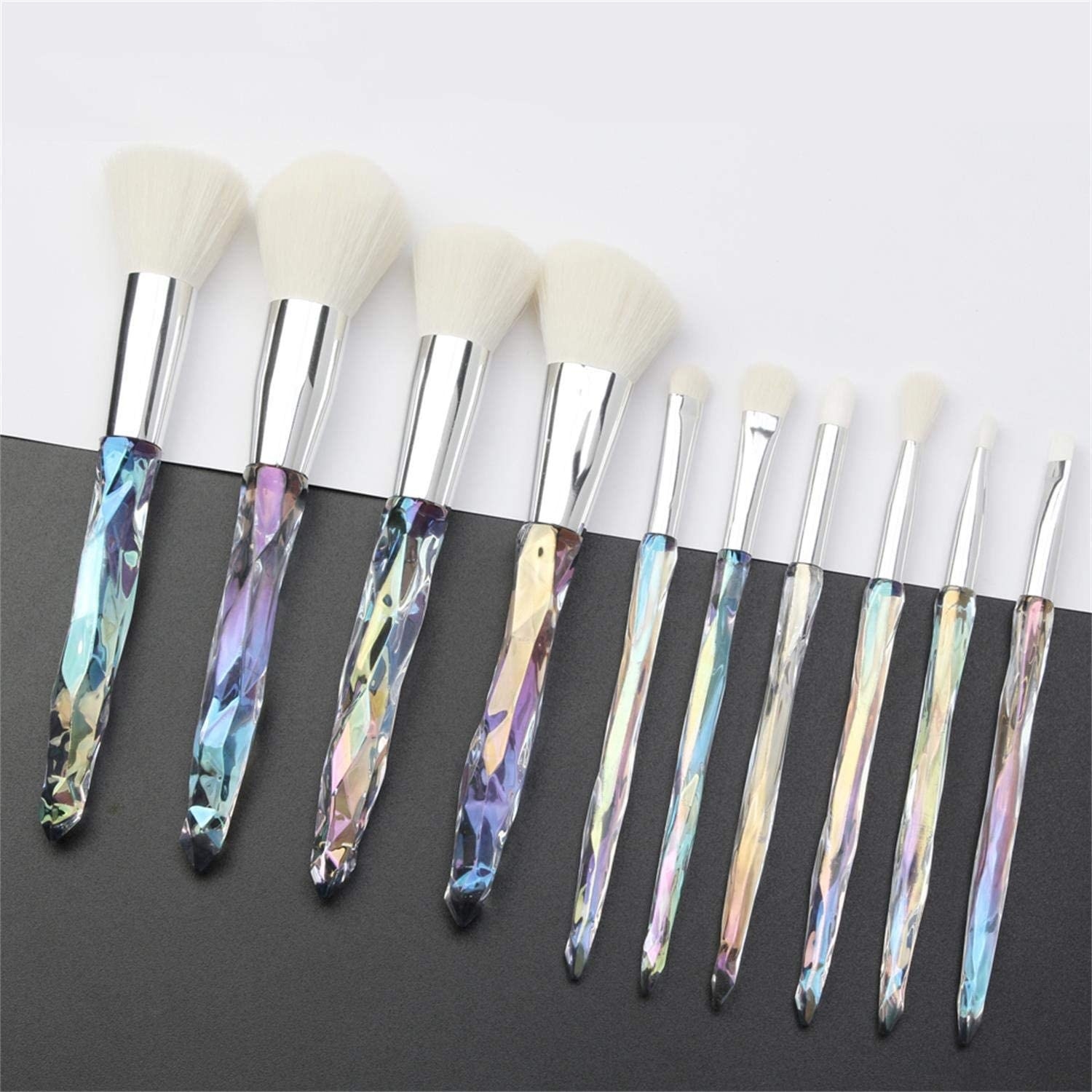 a set of makeup brushes with opalescent faux crystal handles