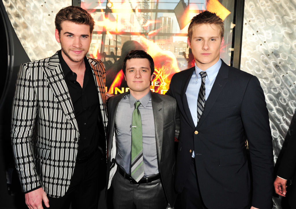 Liam Hemsworth, Josh Hutcherson, and Alexander Ludwig arm in arm