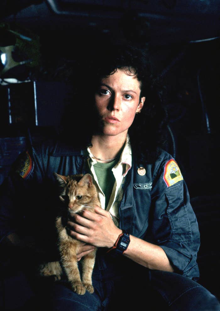 Sigourney Weaver in Alien, holding a cat