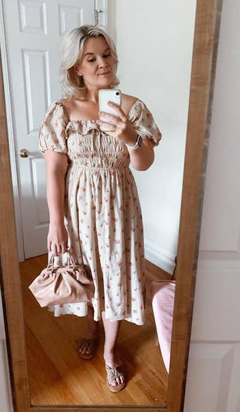 a different reviewer wearing the dress in light pink and beige