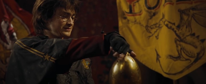 Harry opens a golden egg