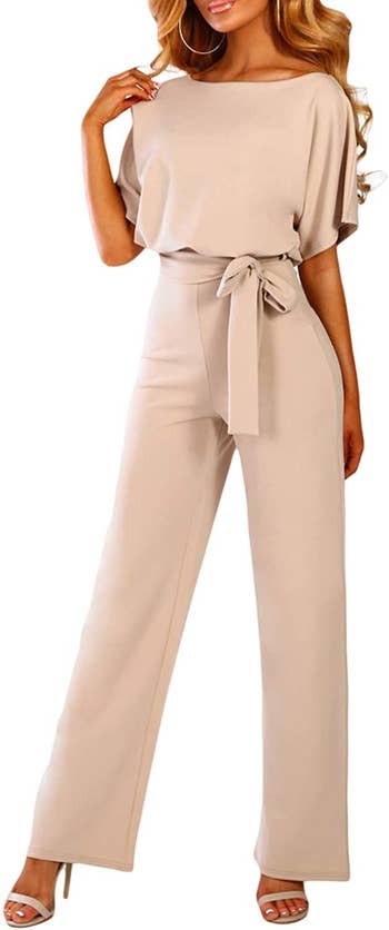 Model wearing the jumpsuit in apricot