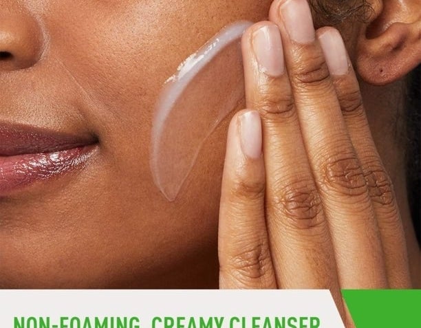 a model applying the cleanser to their skin