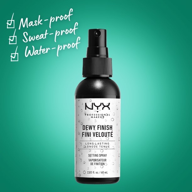 the setting spray against a green background