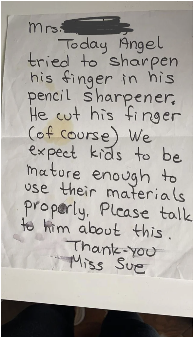 A note from the teacher that says the person&#x27;s kid tried to sharpen his finger in the pencil sharpener