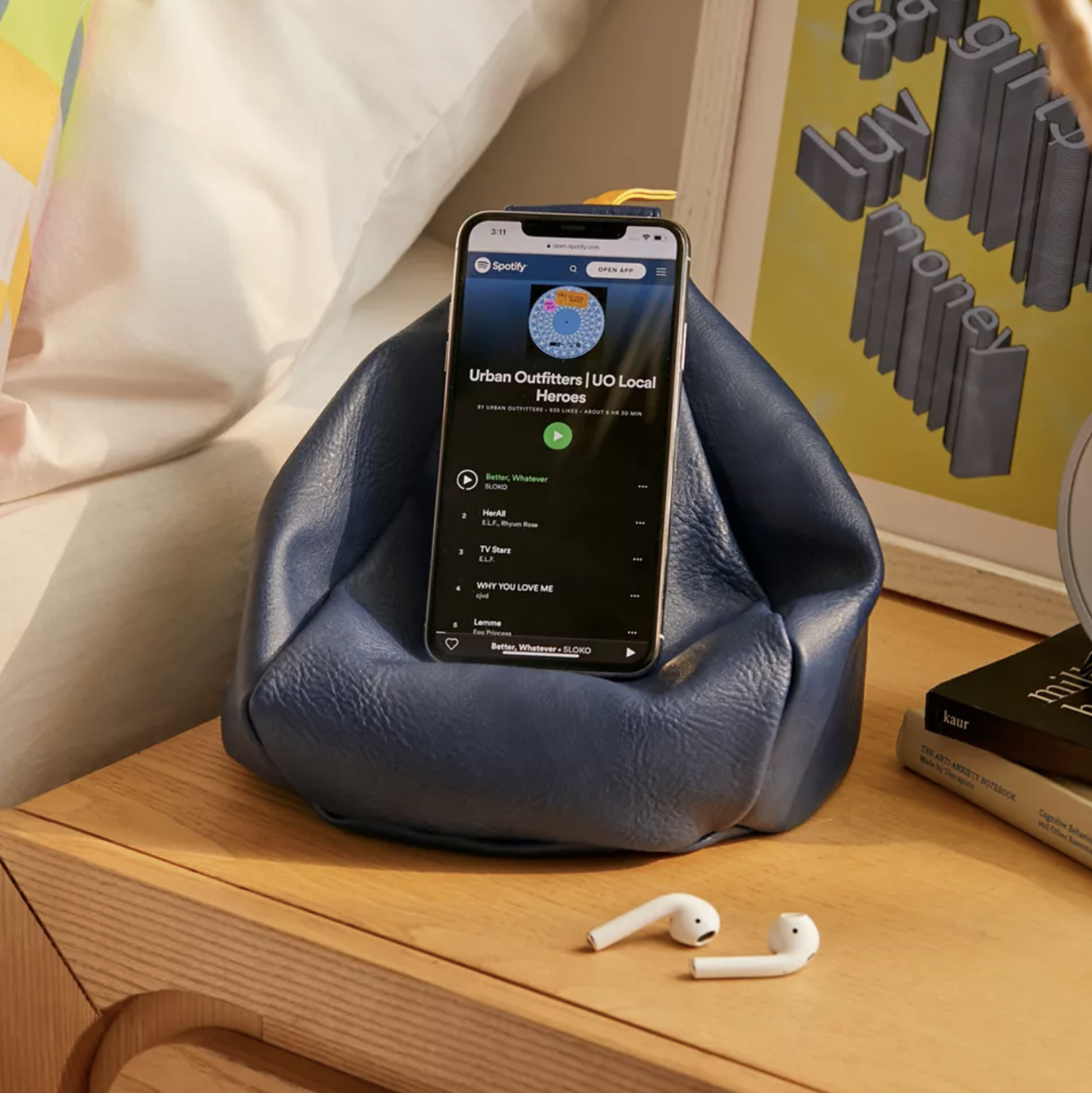 A phone on the bean bag chair on a nightstand