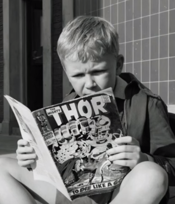 Buddy reading a "Thor" comic in the film