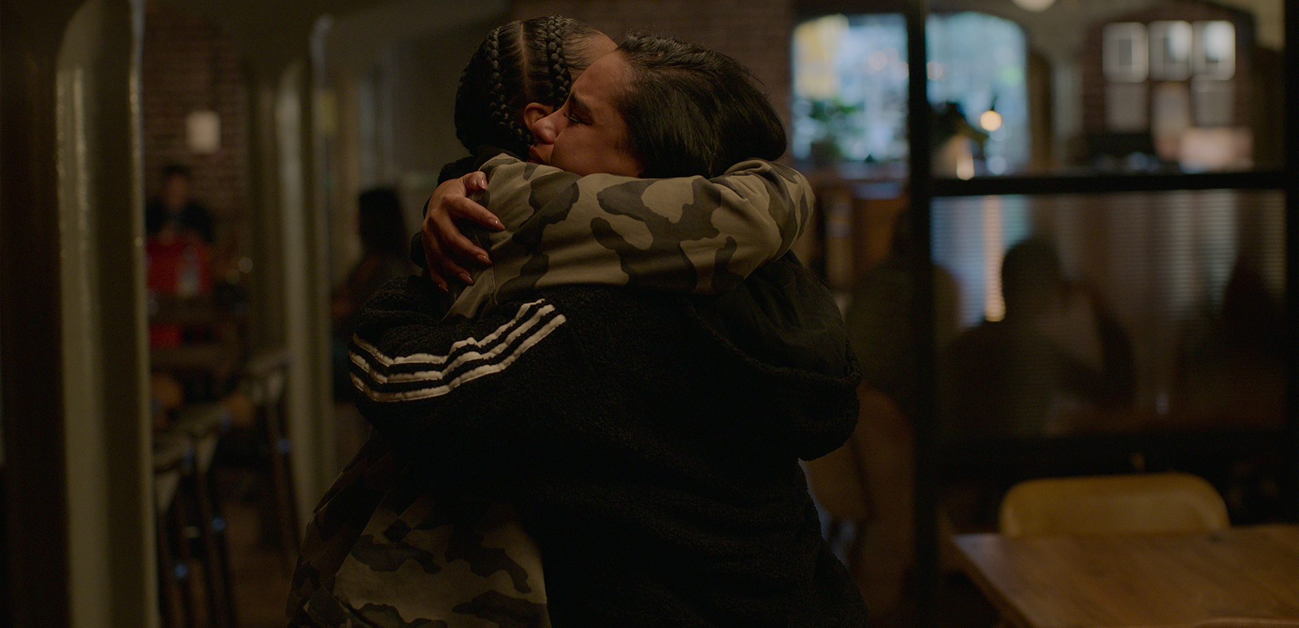 lauryn and jaq embrace