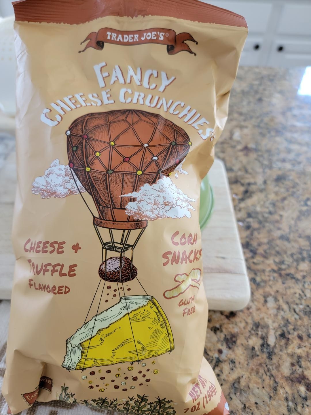 A bag of cheese and truffle flavors corn snacks