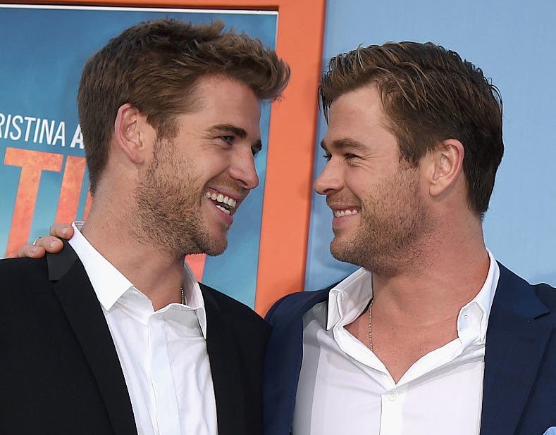 Liam and Chris smile at each other