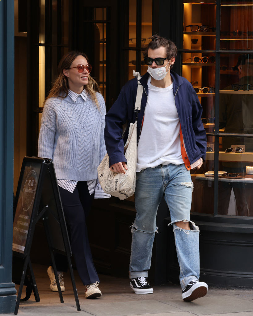 Harry and Olivia stroll through Soho hand-in-hand
