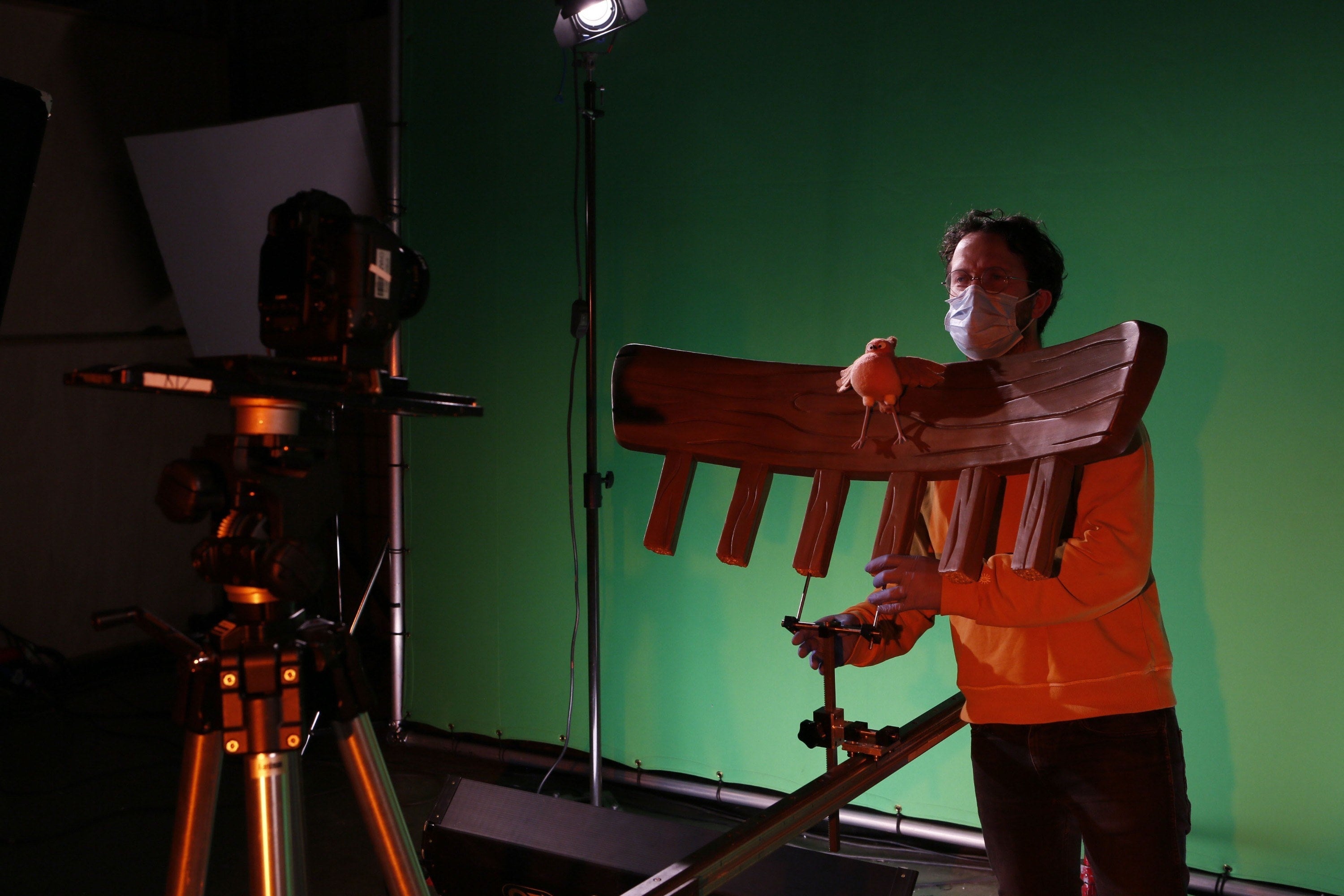 director Michael Please on set in the film