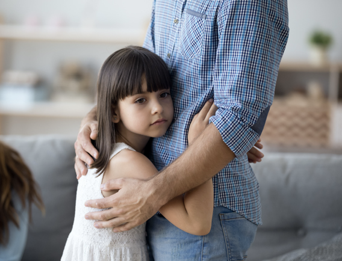 Girl hugging a person