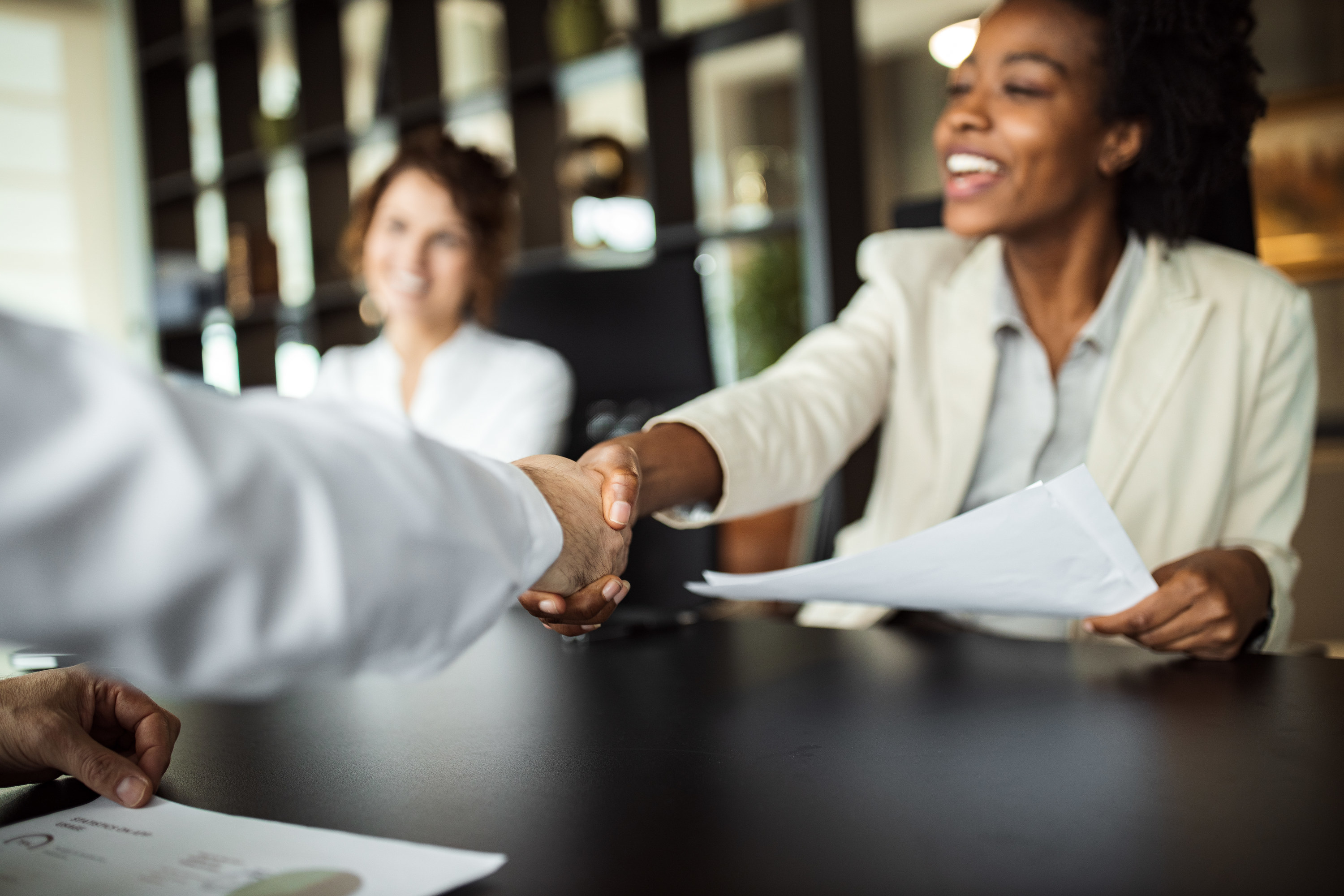 Woman with paper at an interview