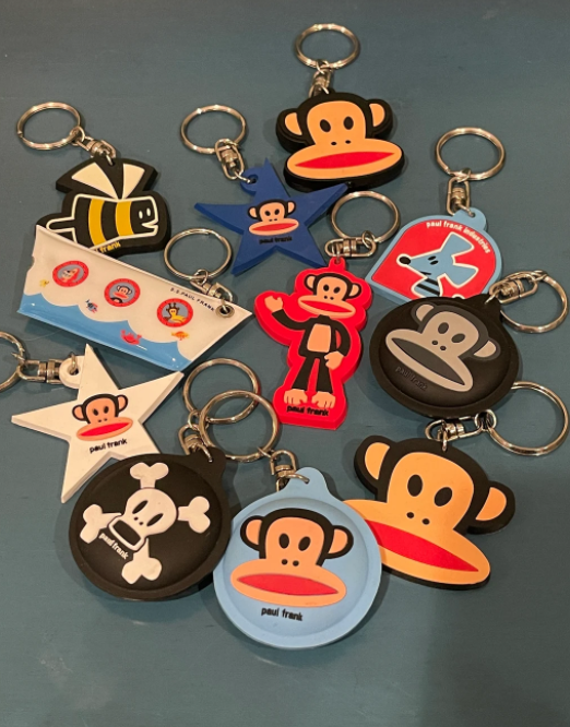 A bunch of Julius the Monkey keychains