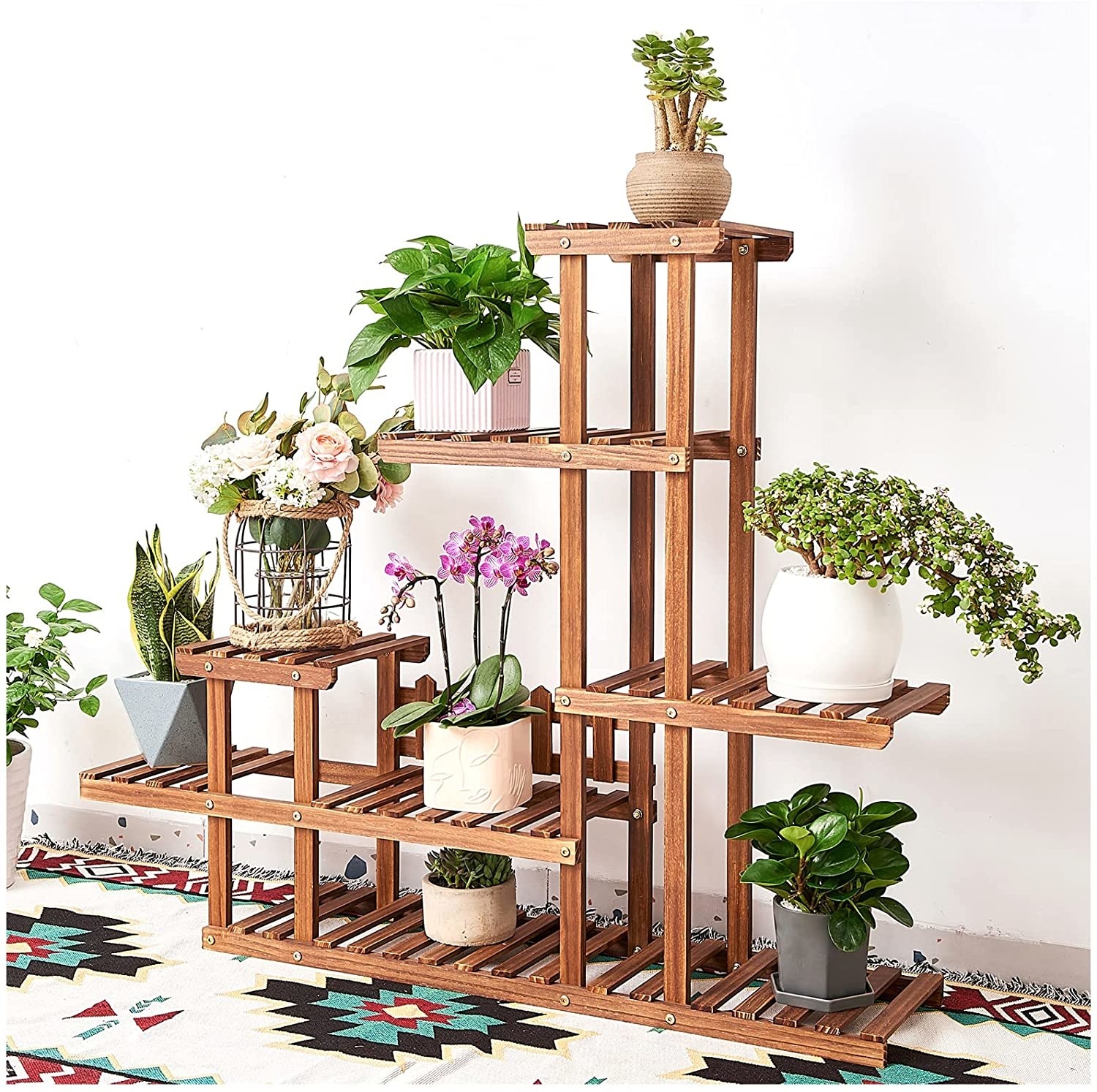 multi level shelf with potted plants on it