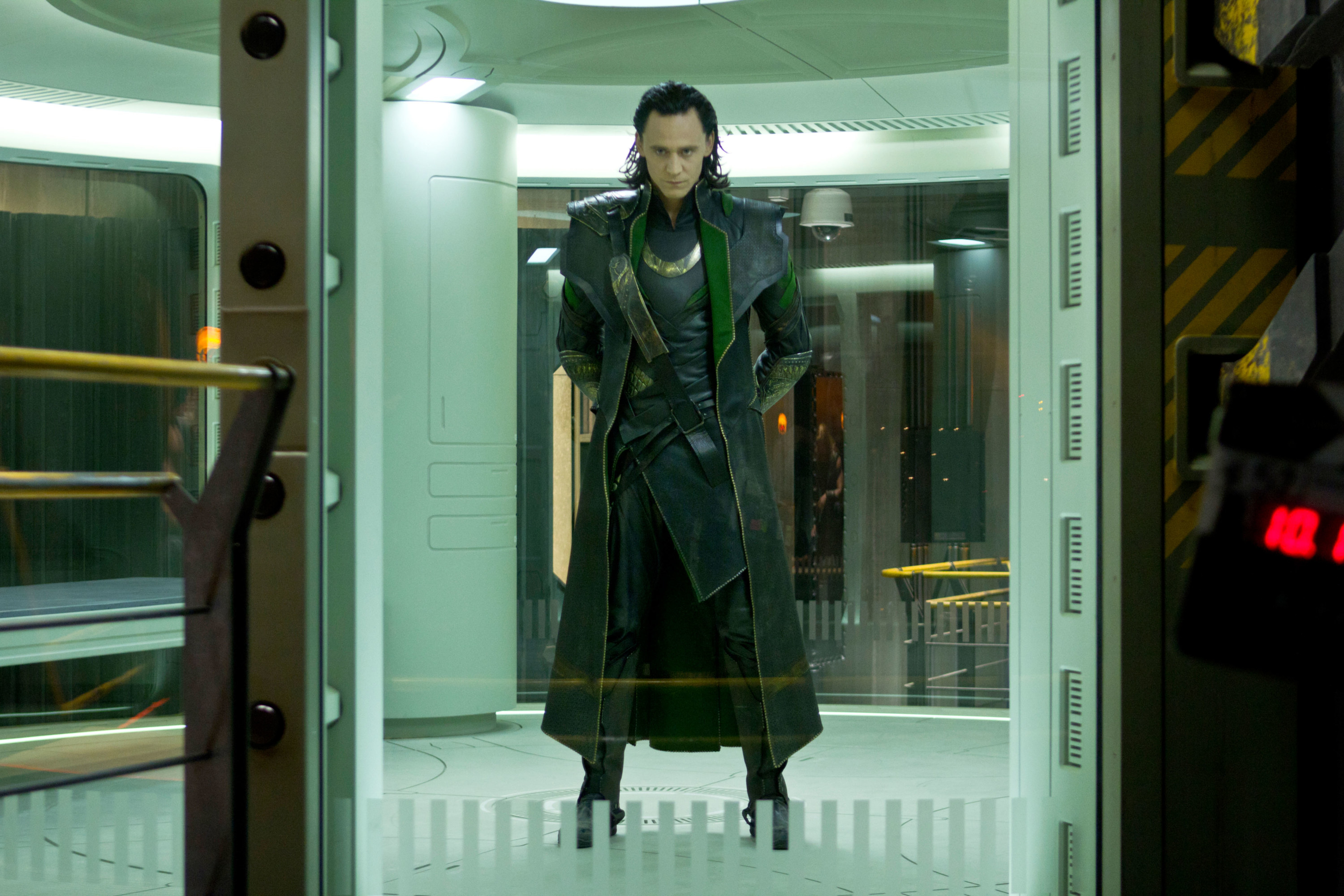 Loki stands patiently in his cell, waiting for his plan to fall into place