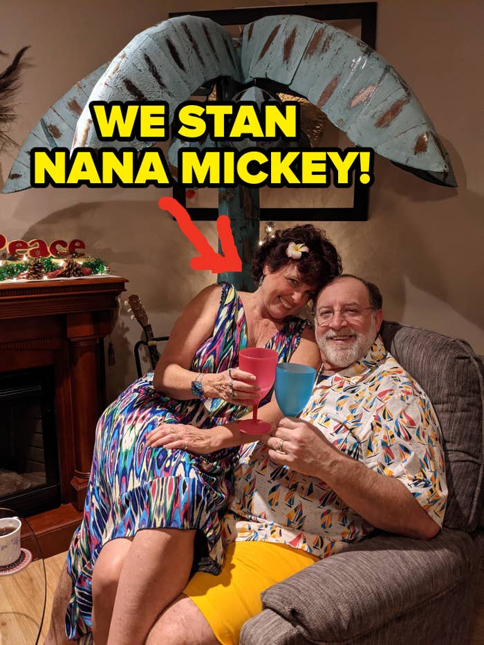 A photo of Nana Mickey sitting on her husband&#x27;s lap, with text overlay that says &quot;We stan Nana Mickey!&quot;