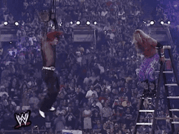 Edge &quot;spears&quot; Jeff Hardy off a Ladder