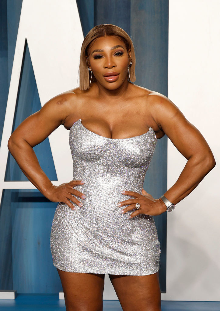 Serena in a short, shiny, strapless dress