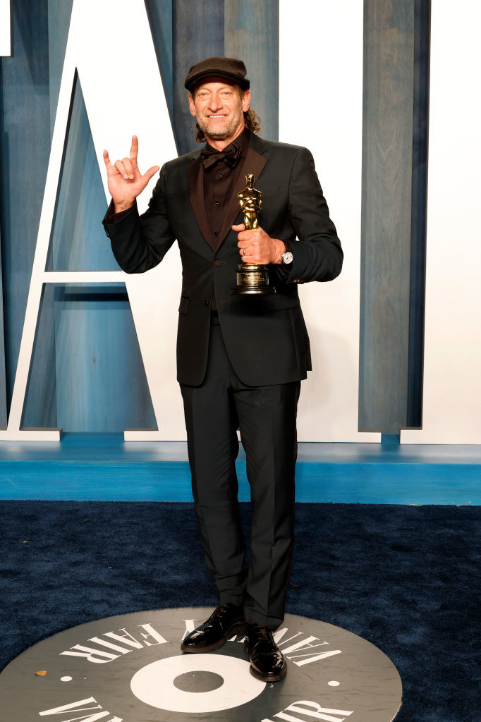 Troy holding an Oscar