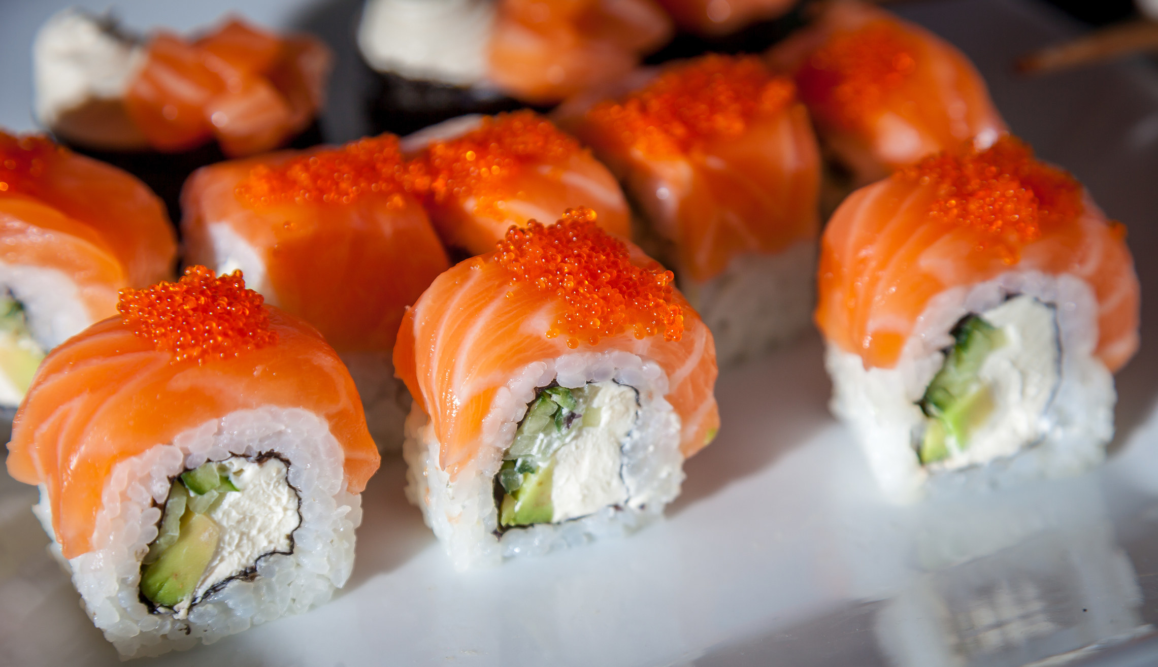 Salmon sushi with cream cheese and avocado