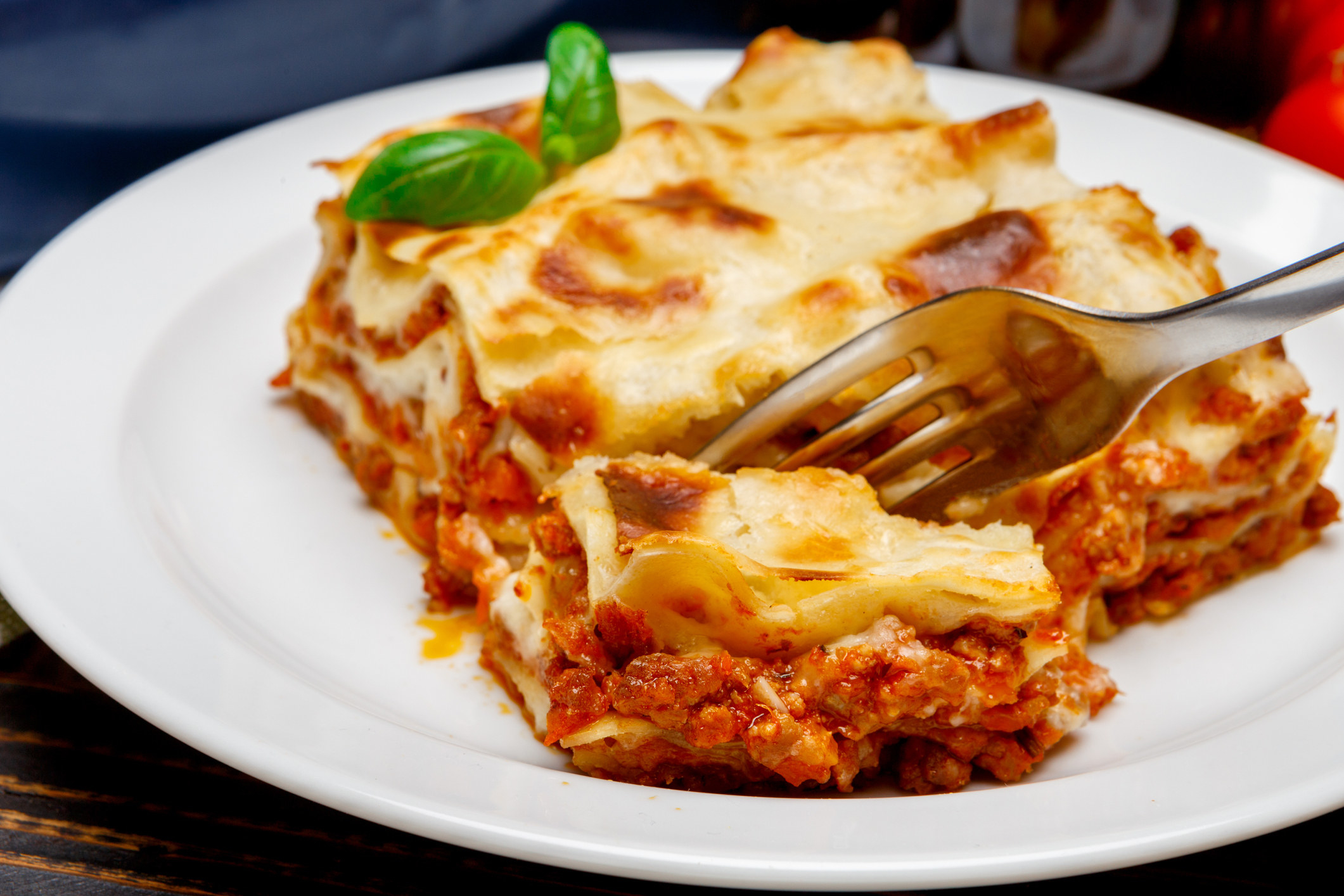 A slice of lasagna on a plate