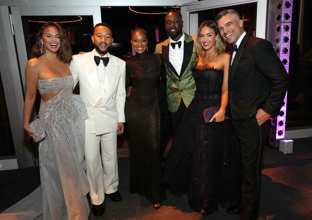 Chrissy Teigen and John Legend, Gabrielle Union and Dwyane Wade, and Jessica Alba and Cash Warren standing together and smiling