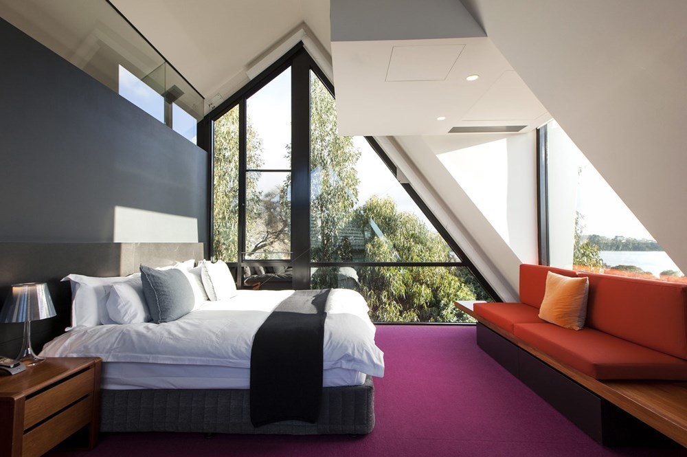 One of the rooms at the hotel, featuring angular windows and ultra-modern design