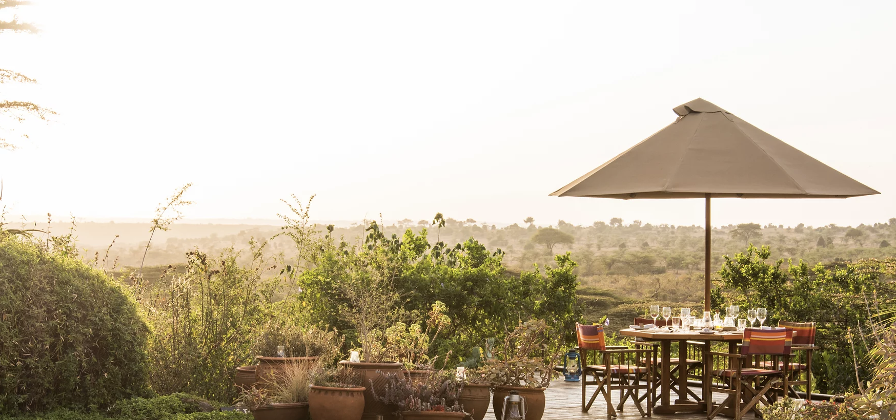 A sweeping view of the savanna from the Ololo Lodge&#x27;s grounds