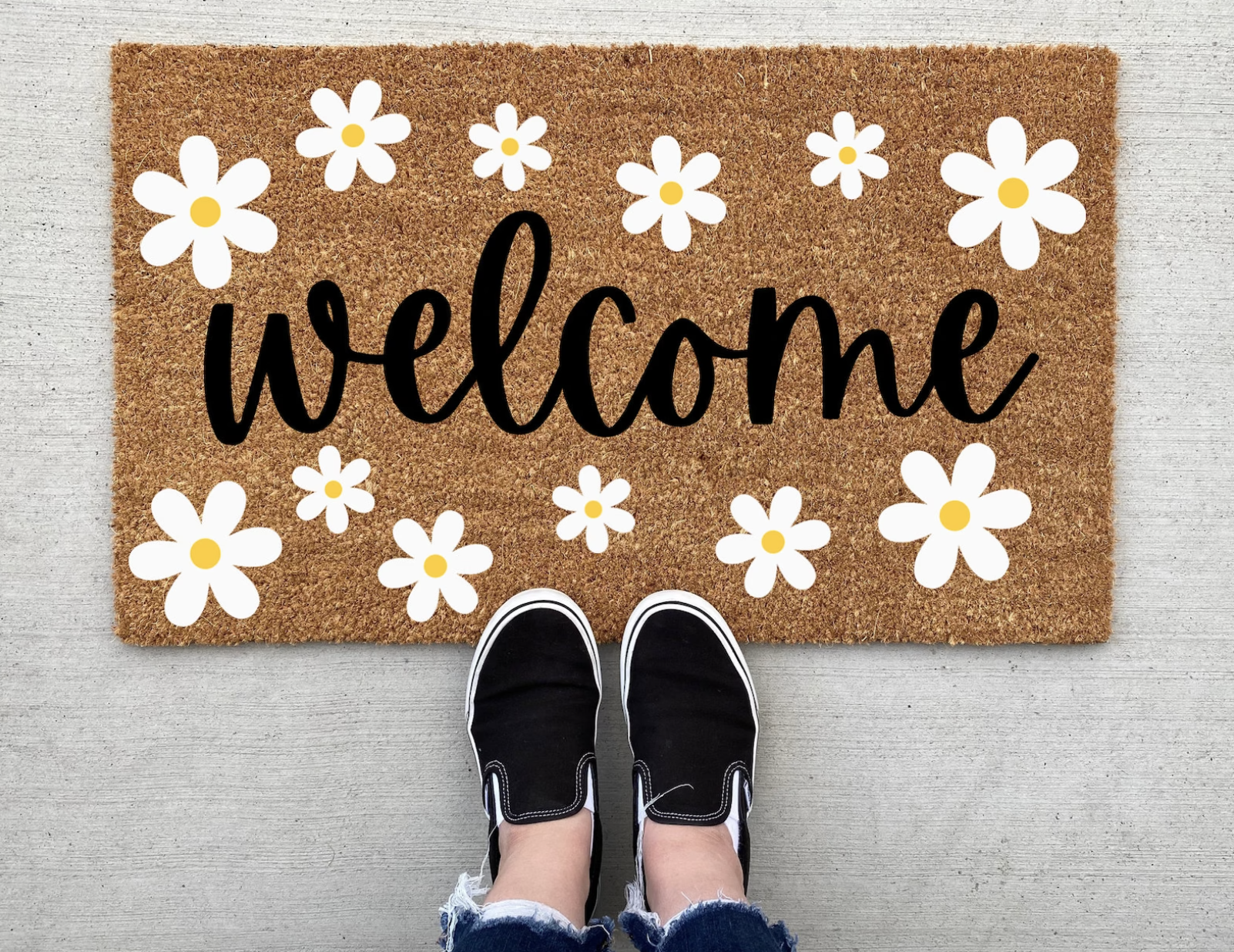 doormat with daisy pattern on it