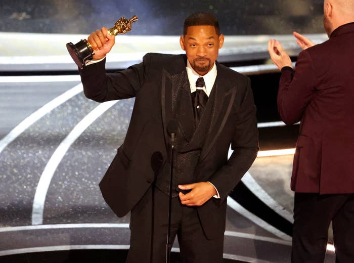 Will Smith brandishes his Oscar during his acceptance speech