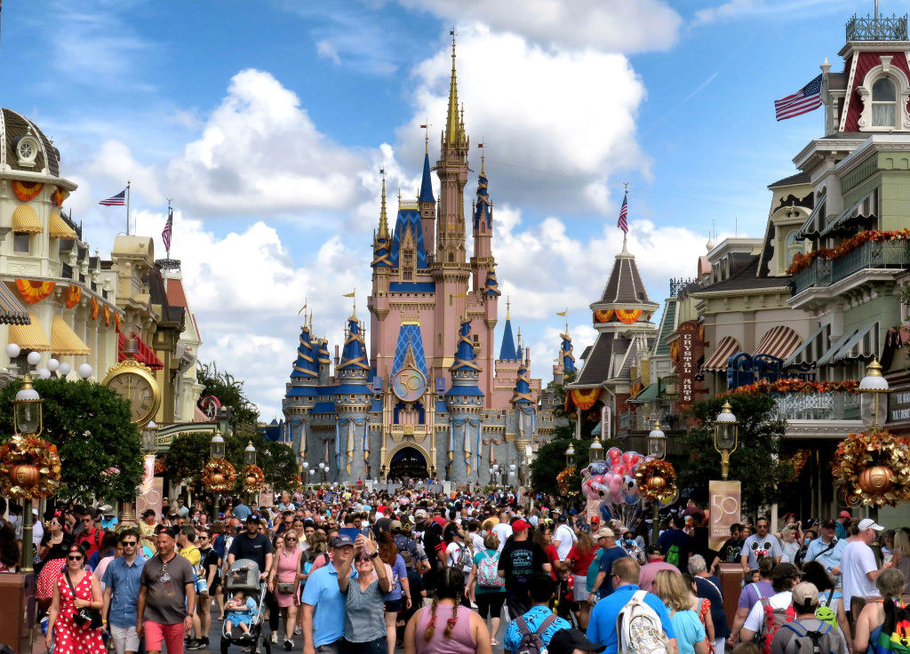 Disney&#x27;s Magic Kingdom and a big crowd.