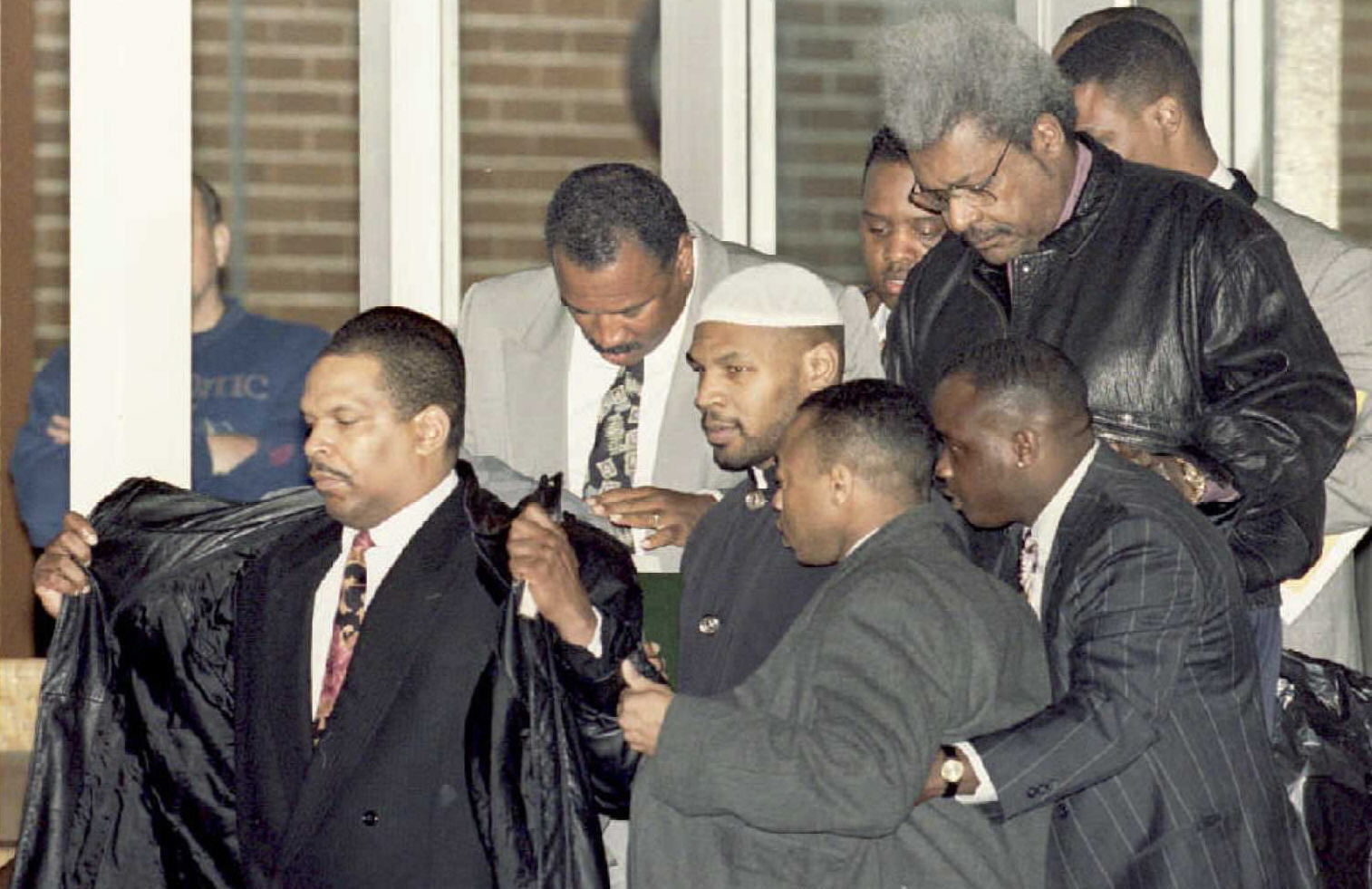 Mike Tyson leaving Indiana Youth Center with Don King after being released from prison in March 1995