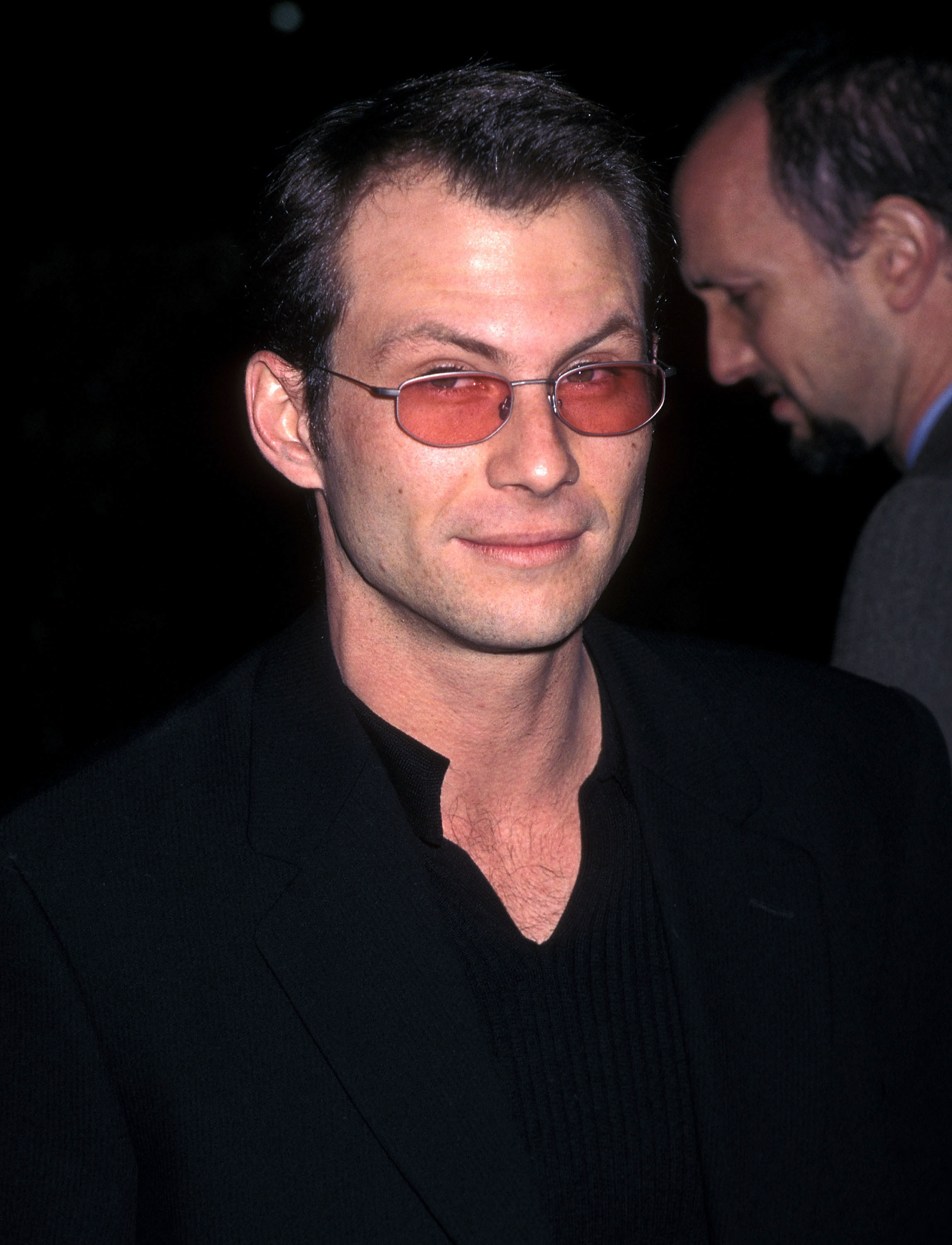 Christian Slater at &quot;Hard Rain&quot; premiere in 1998 wearing rose-colored glasses