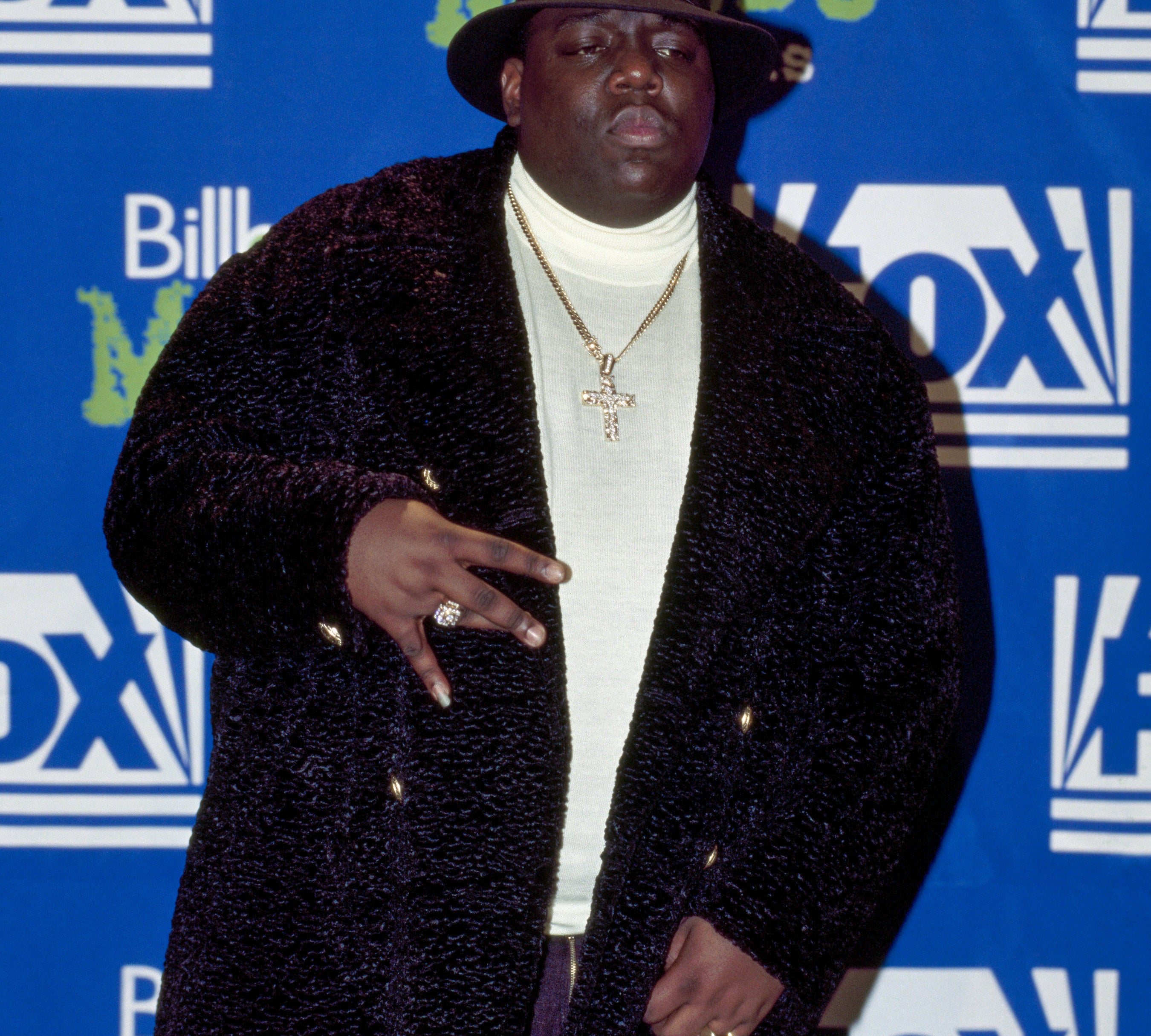 Rapper Notorious B.I.G., aka Biggie Smalls (Christopher Wallace), receives Billboard Music Award on December 6, 1995
