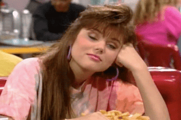 Kelly daydreaming on Saved by the Bell