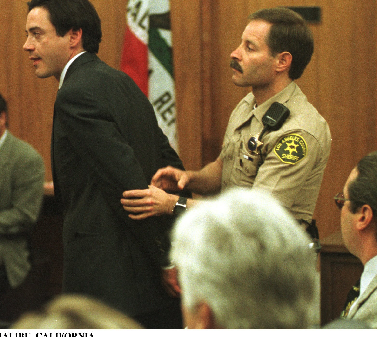 Robert Downey Jr. is taken into custody after the judge ordered him to jail