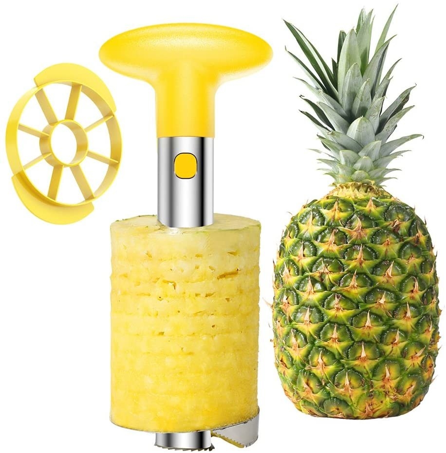The pineapple tools being used to cut through a pineapple