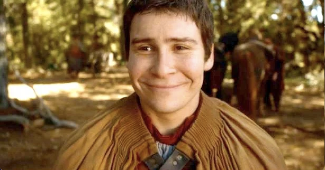 Daniel Portman as Podrick Payne smiling widely