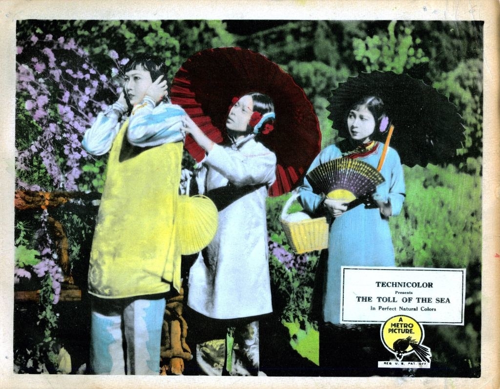 A Technicolor movie poster of three women in a garden
