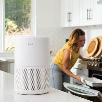 Levoit air purifier sitting on kitchen counter