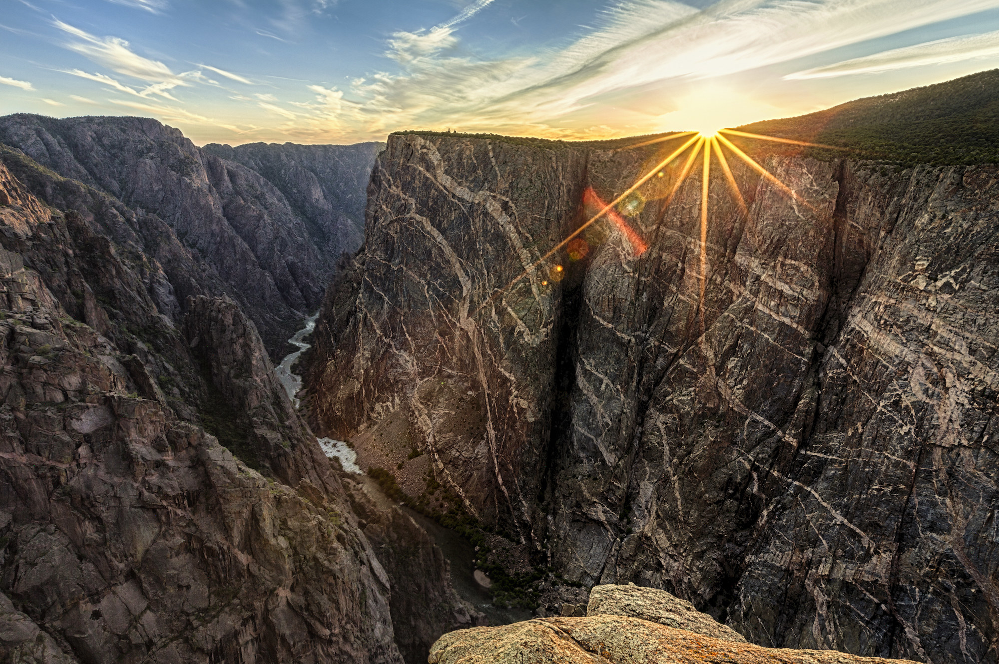 a canyon with a river in the middle