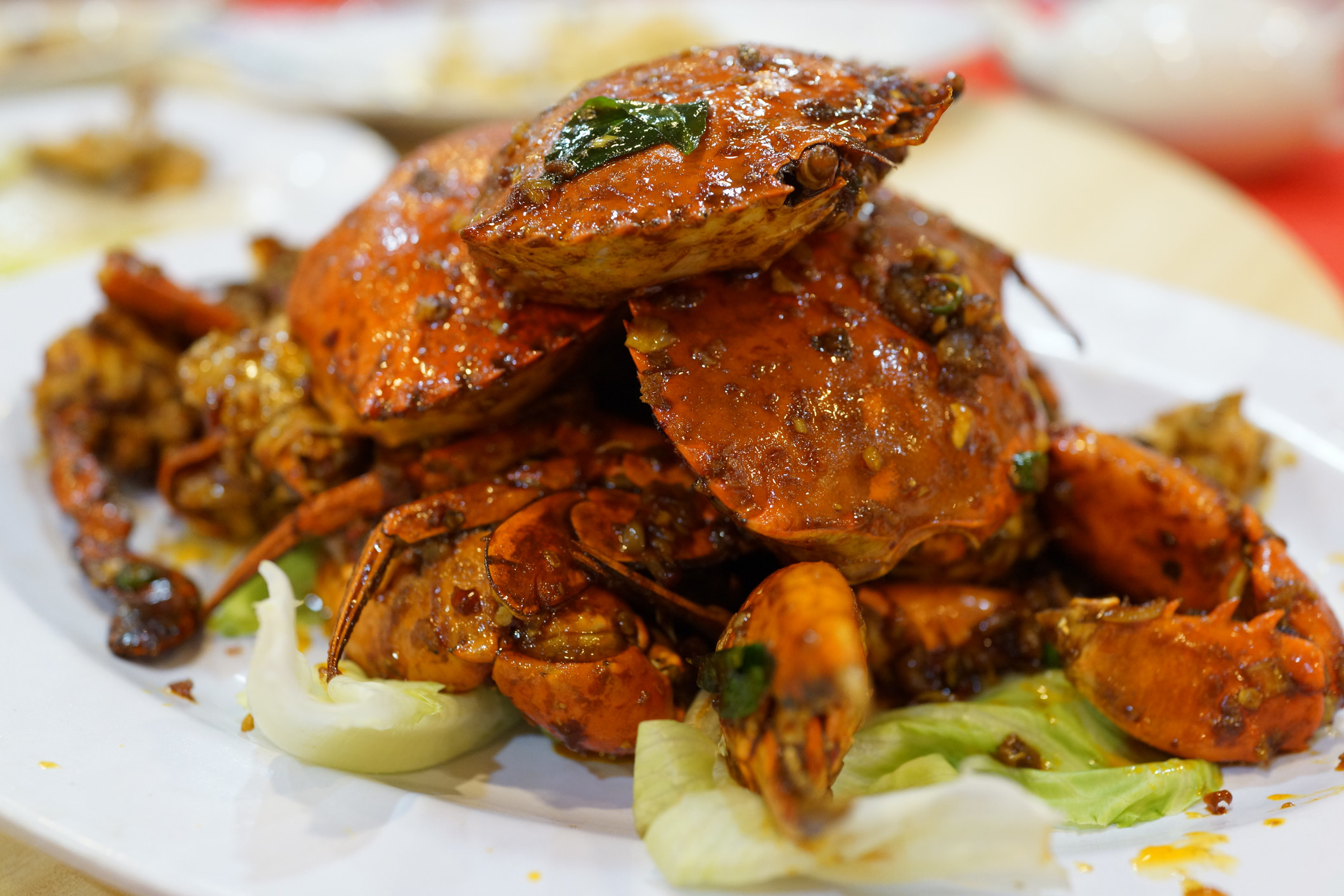Black pepper crab on a plate.