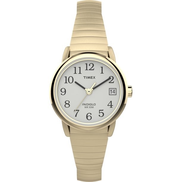 A gold watch with a big white face and large numbers