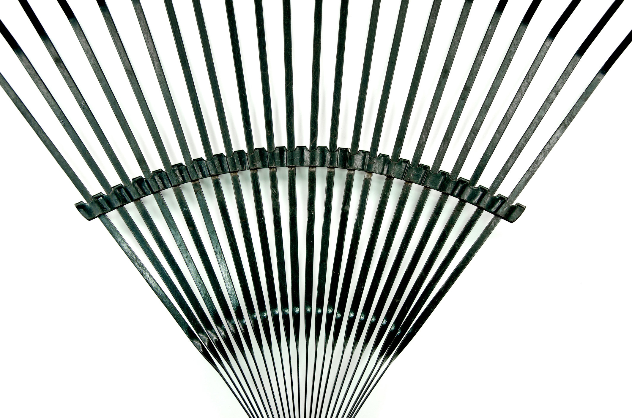 A stark, black rake on a white background