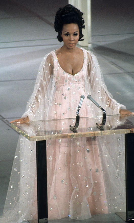 Diahann wearing a very light pink and white sparkling gown